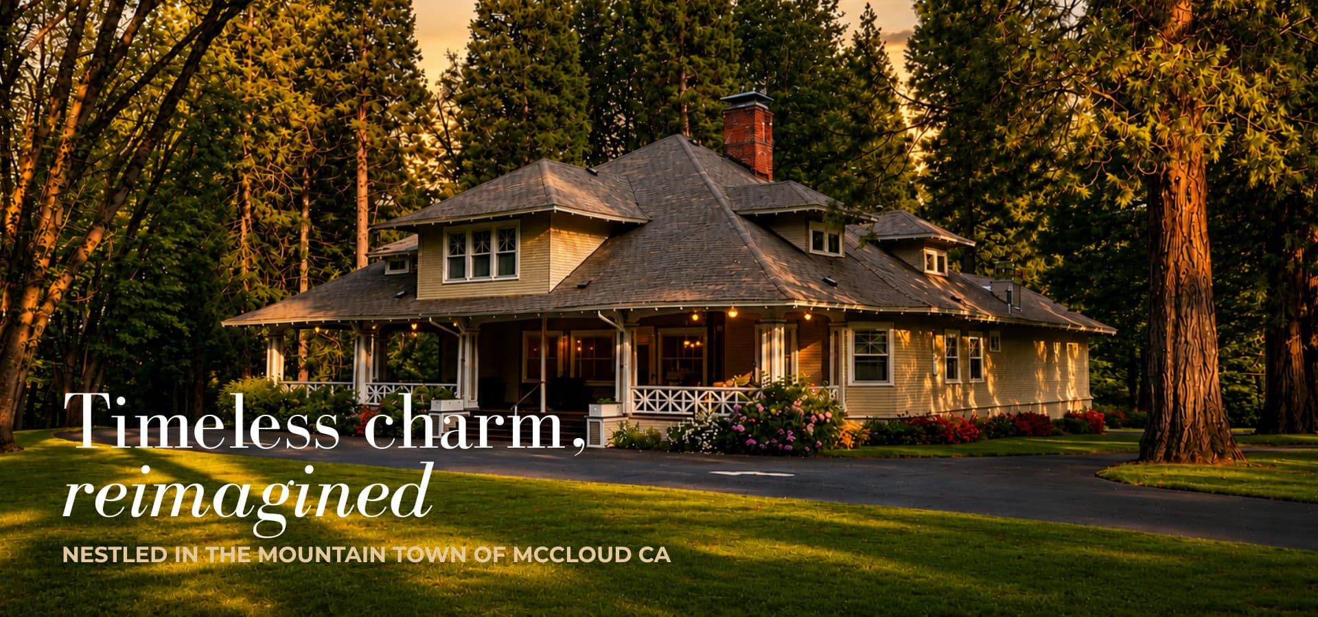 A charming mountain house in McCloud, CA, surrounded by tall trees at sunset.