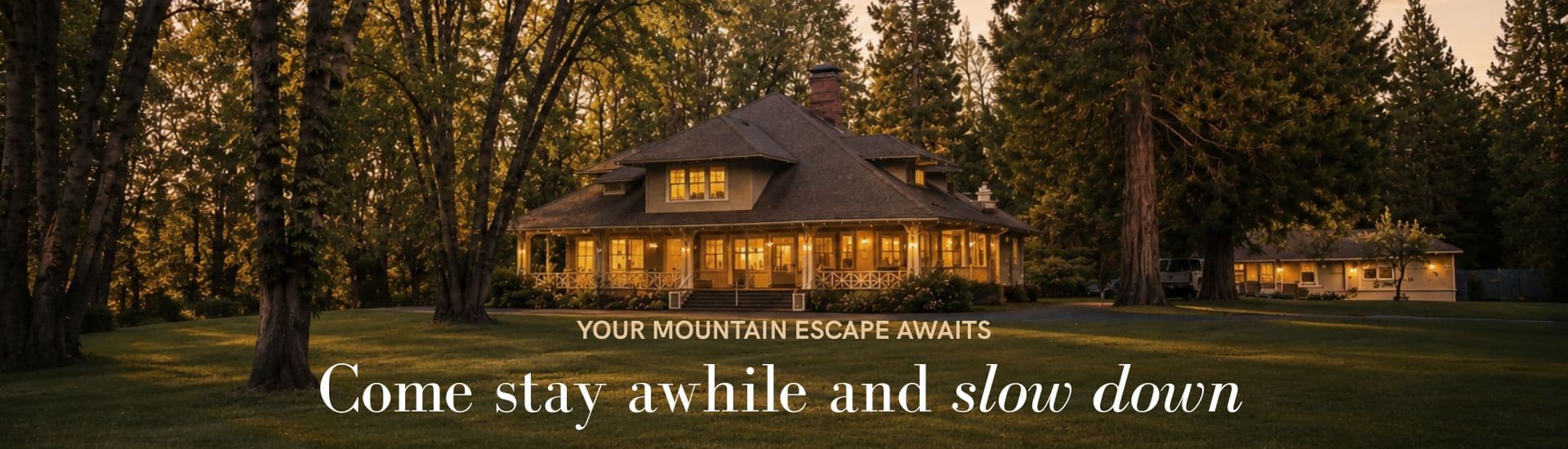 A cozy mountain retreat surrounded by trees, inviting visitors to relax and unwind.